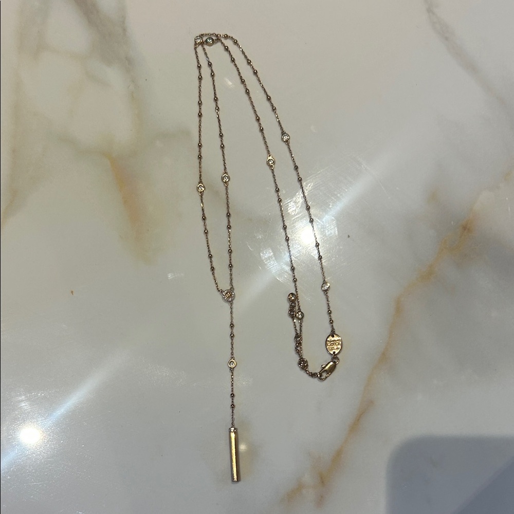 Henri Bendel Gold rosary necklace